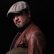 津ケ谷友則（Dr）