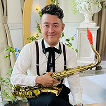 写真:向井志門(Sax)